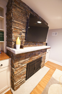 Castle Building & Remodeling, Inc. - Twin Cities Design / Build Firm | A Basement Fireplace view