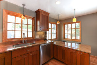 Kitchen sink, cabinets and windows