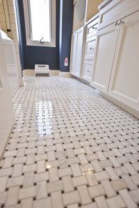 Castle Building & Remodeling, Inc. - Twin Cities Design / Build Firm | View of Marble Mosaic Tile Floor in Main Floor Bathroom Remodel