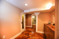 Wine pantry and view of bathroom